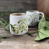 Large rustic stoneware mug with mistletoe design