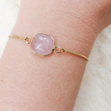 Rose Quartz square slider bracelet worn on the wrist