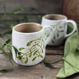Large rustic stoneware mug with mistletoe design, additional view