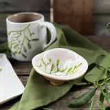 Mini stoneware bowl with green mistletoe design, additional view