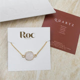 Clear Quartz slider bracelet on ROC display card with Quartz meaning card