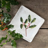 Square stoneware plate with green holly design, additional view