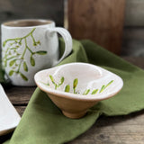 Mini stoneware bowl with green mistletoe design, additional view