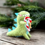 Lime green felt T-rex holding a candy cane