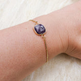 Amethyst square slider bracelet worn on the wrist