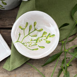 Mini stoneware bowl with green mistletoe design, additional view