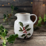 Large stoneware jug with holly and berries design, additional view