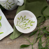 Mini stoneware bowl with green mistletoe design, additional view