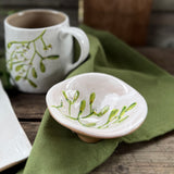 Mini stoneware bowl with green mistletoe design, additional view