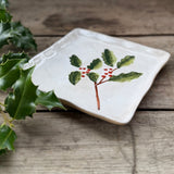 Square stoneware plate with green holly design, additional view