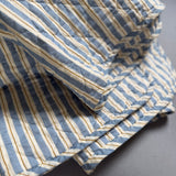 Blue, Brown and White Striped Quilt
