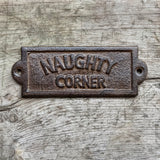 Naughty Corner cast iron sign