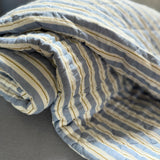 Blue, Brown and White Striped Quilt