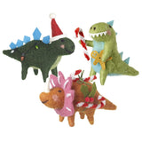 Felt standing dinosaurs with Santa hat and candy canes on a white background