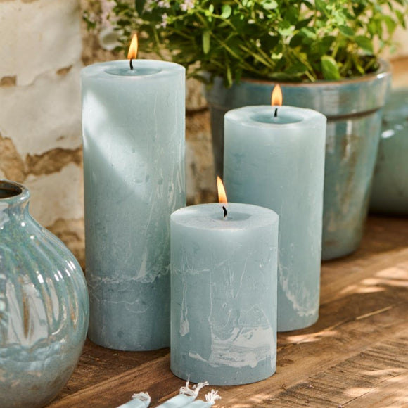 Rustic Pillar Candles in Summer Sky